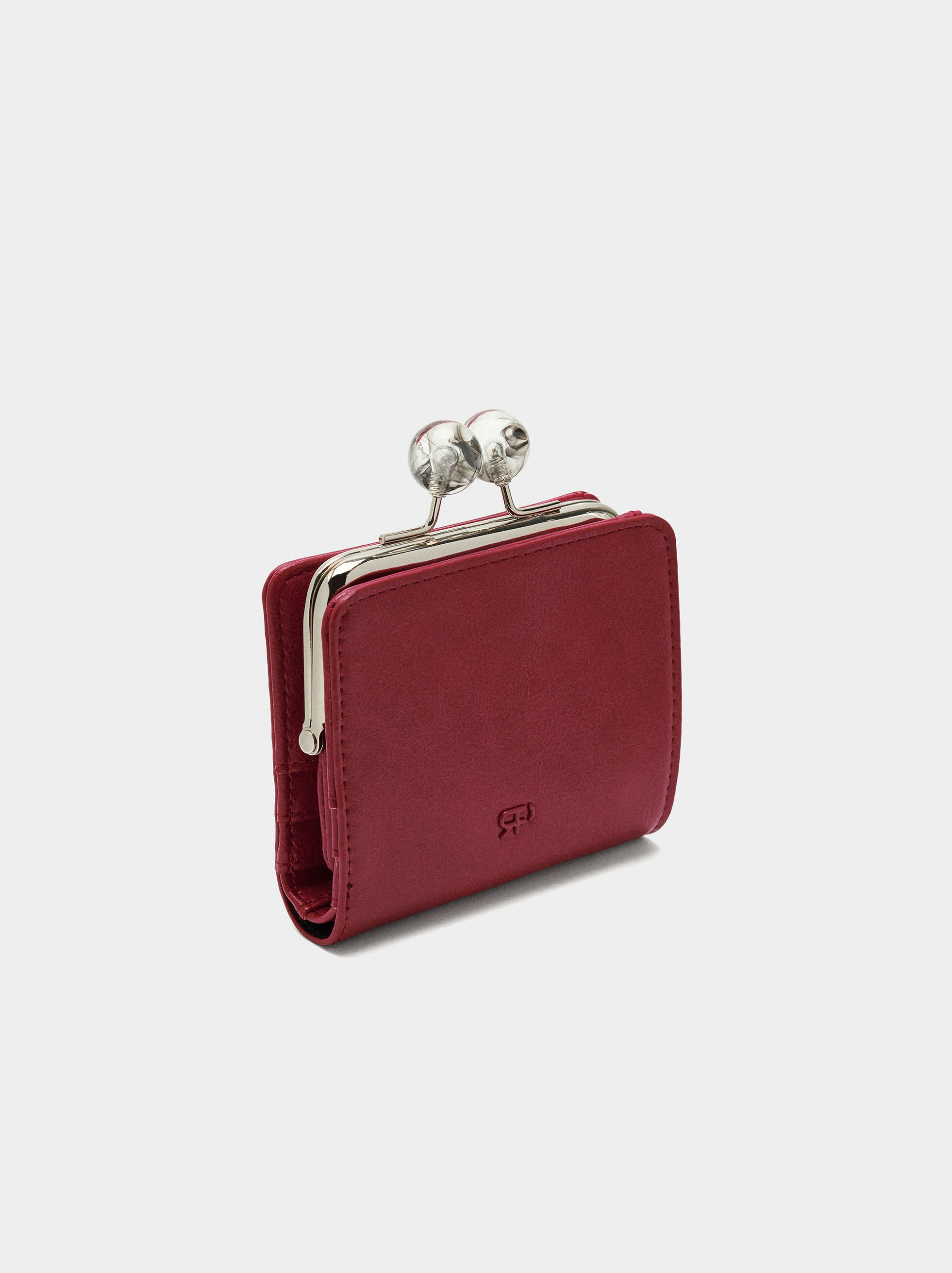 Porte-monnaie avec clous et fermeture à boucle