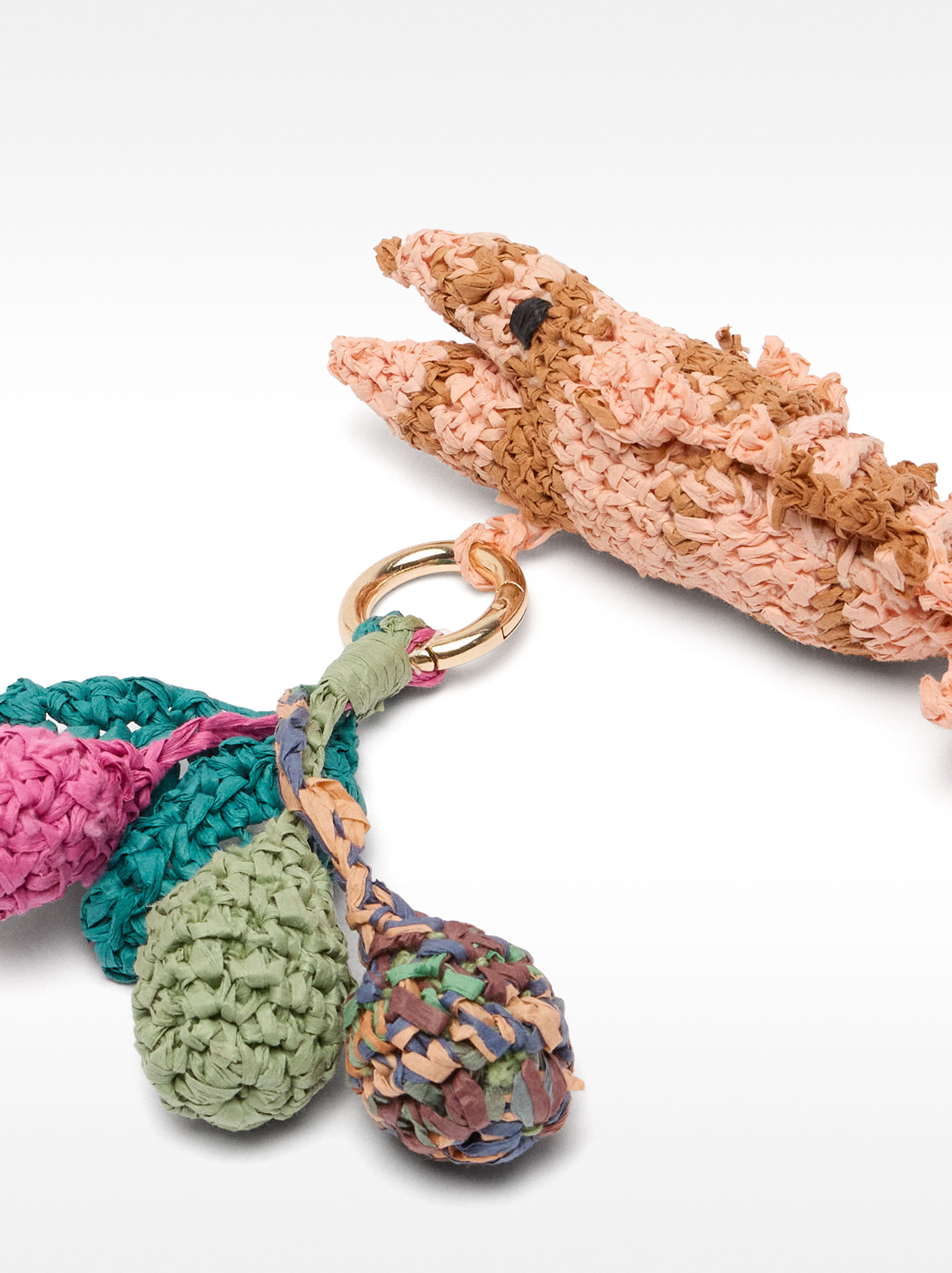 Porte-clés en forme de poisson en raphia multicolore
