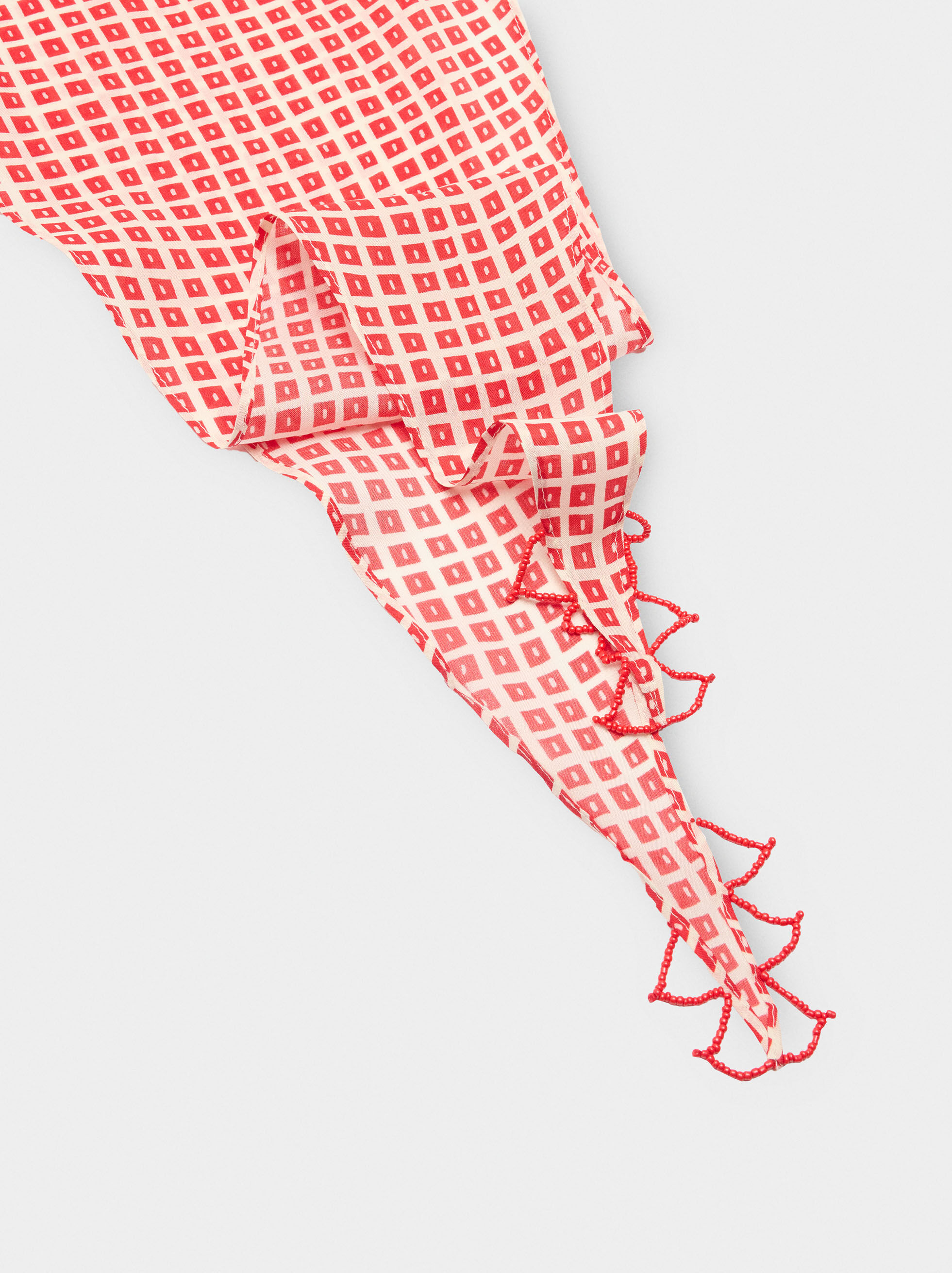 Foulard triangulaire imprimé avec des perles