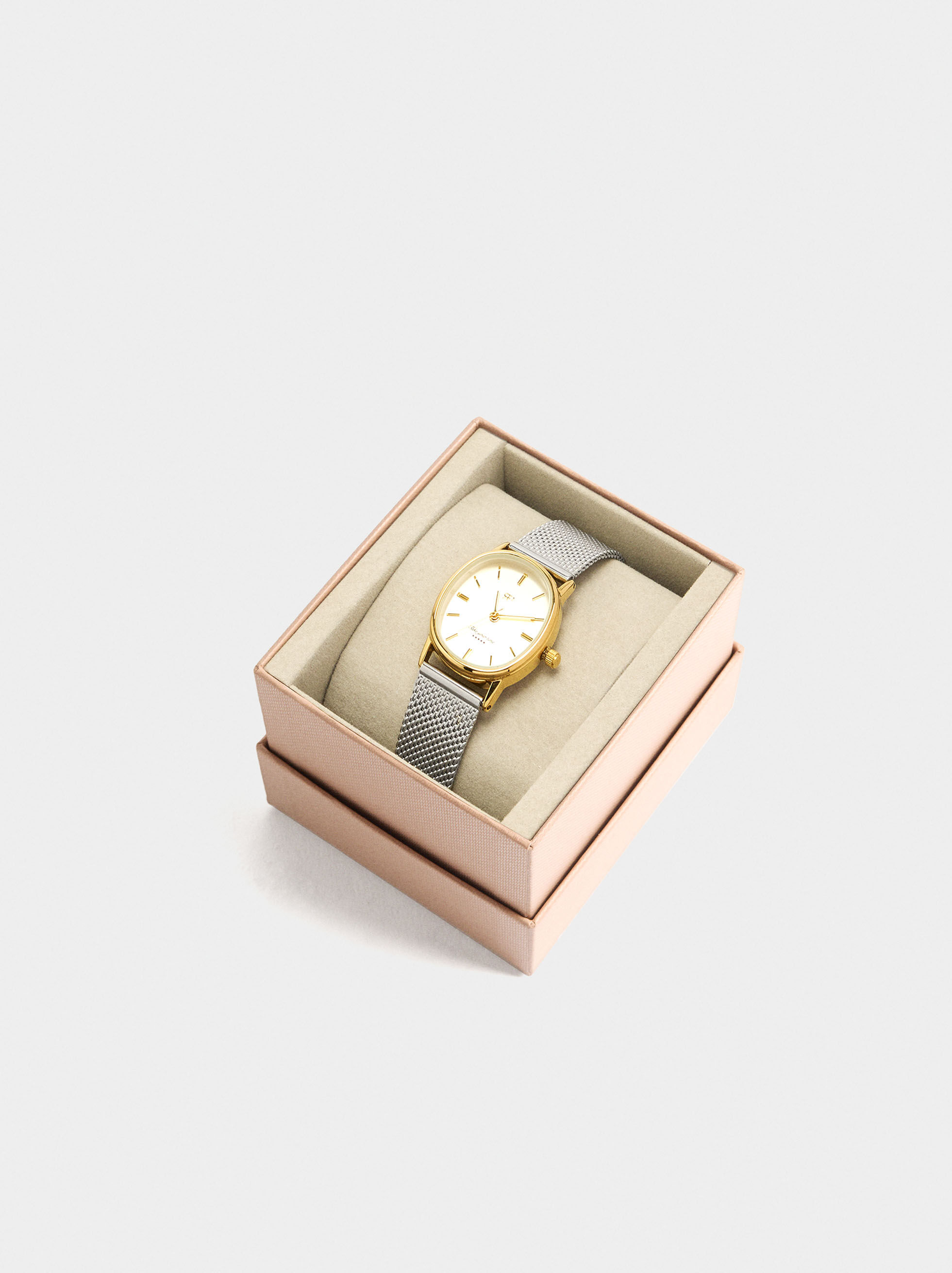 Montre ovale bicouleur avec bracelet en acier inoxydable