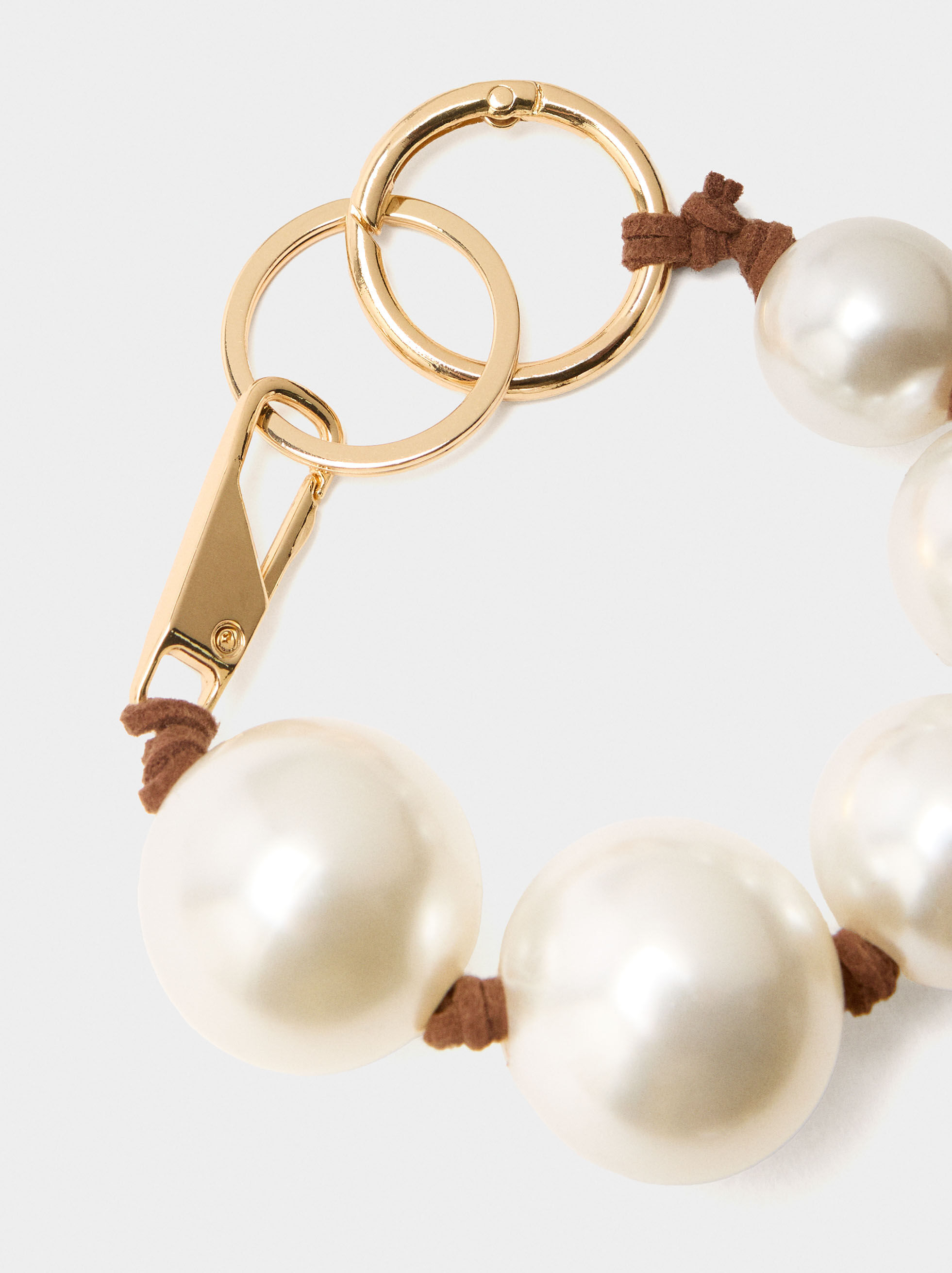Porte-clés en forme de charm avec perles