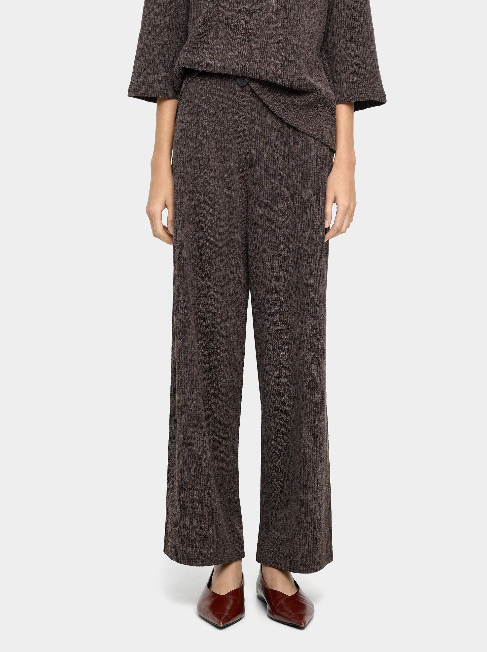 Pantalons avec poches et texture