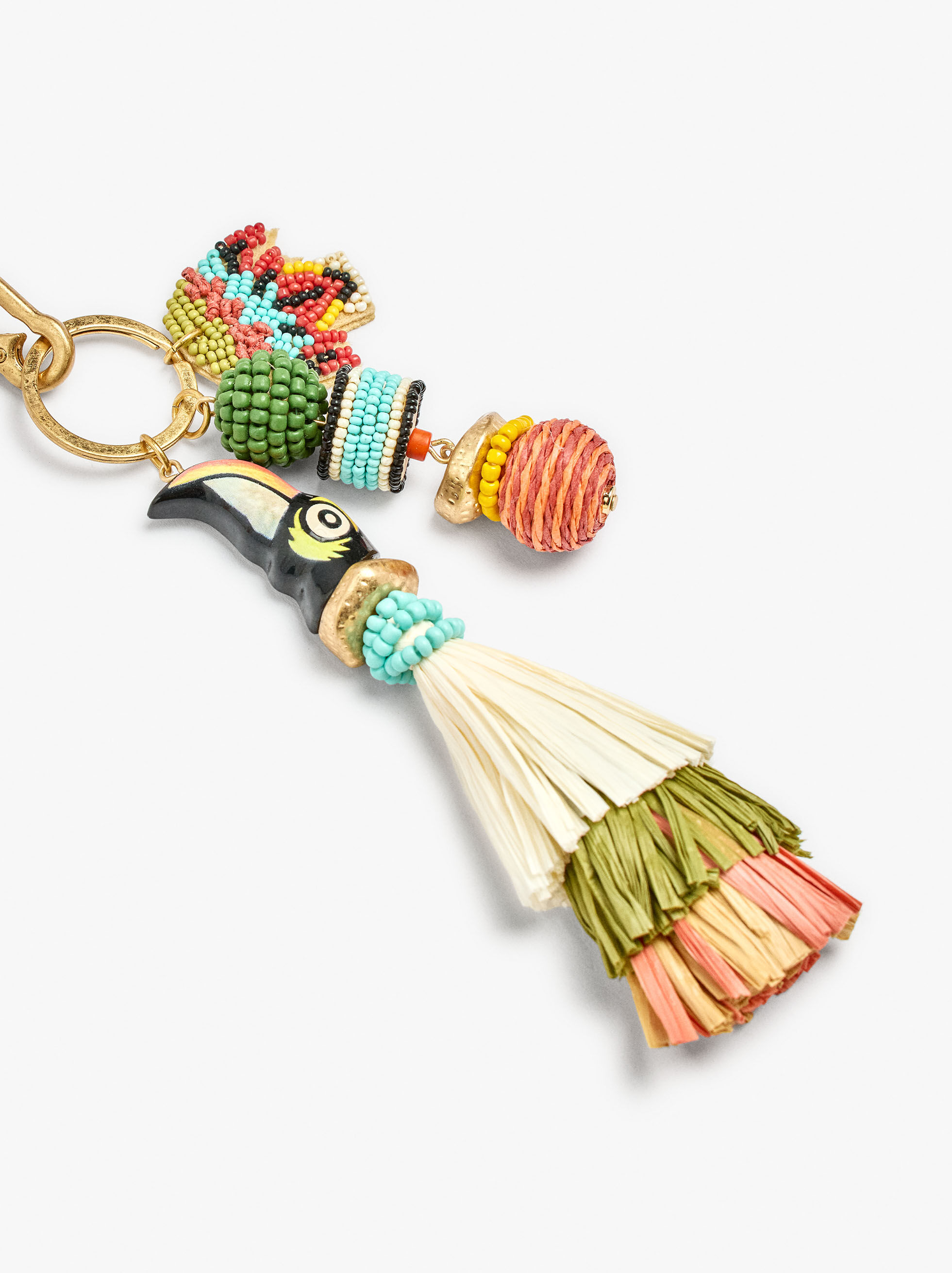 Porte-clés en forme d'oiseau avec perles