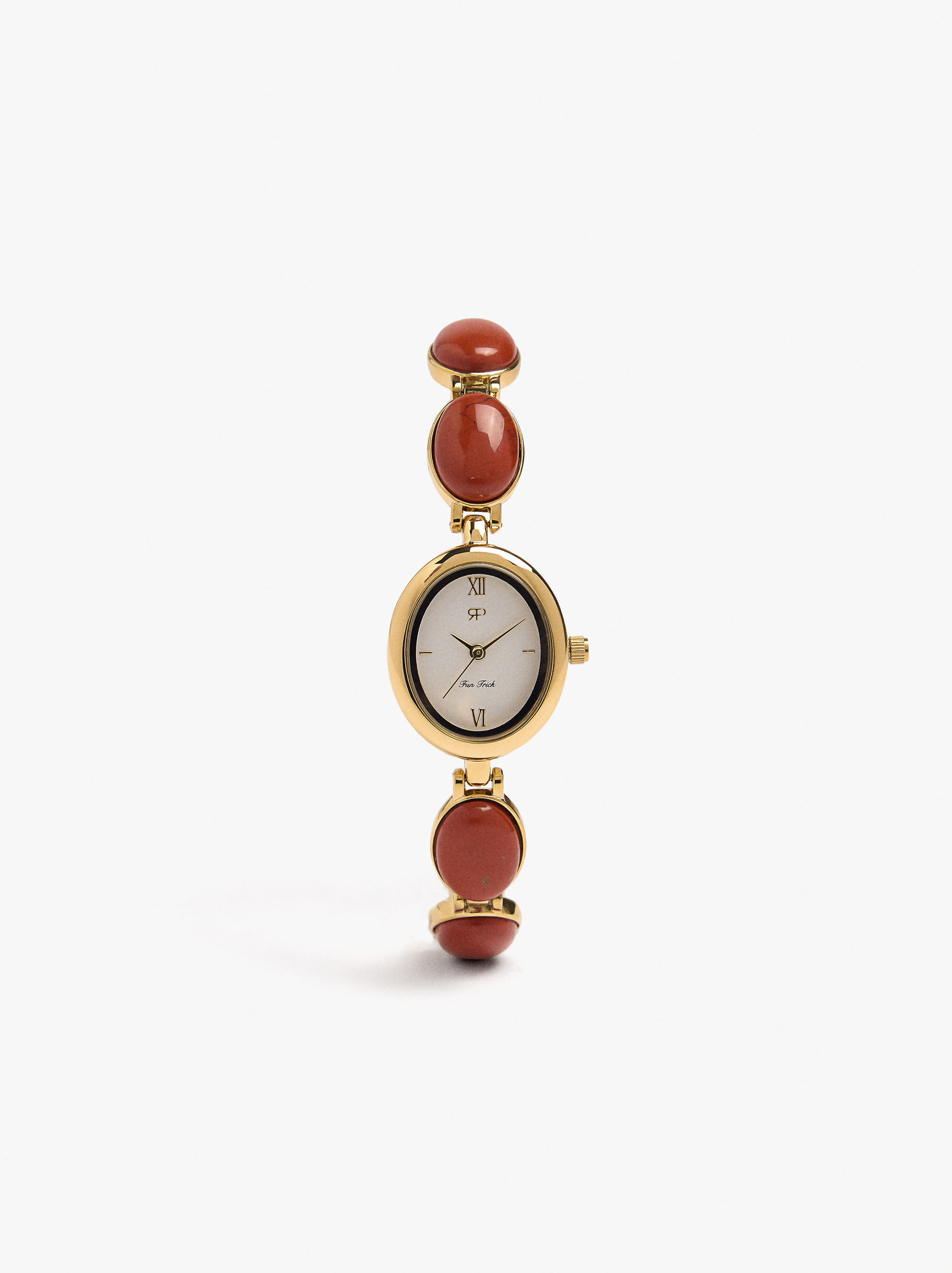 Montre ovale avec bracelet de pierres