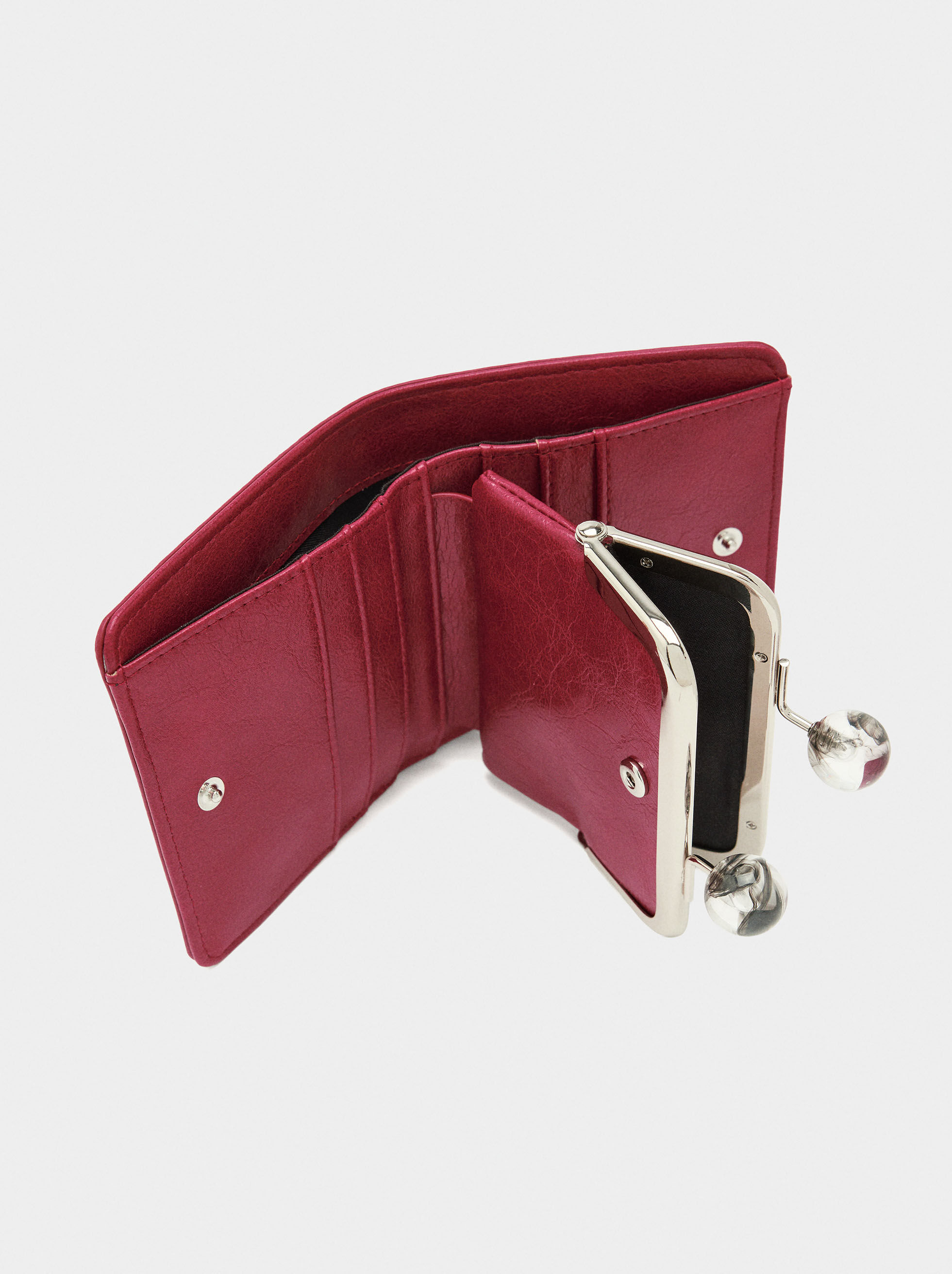 Porte-monnaie avec clous et fermeture à boucle