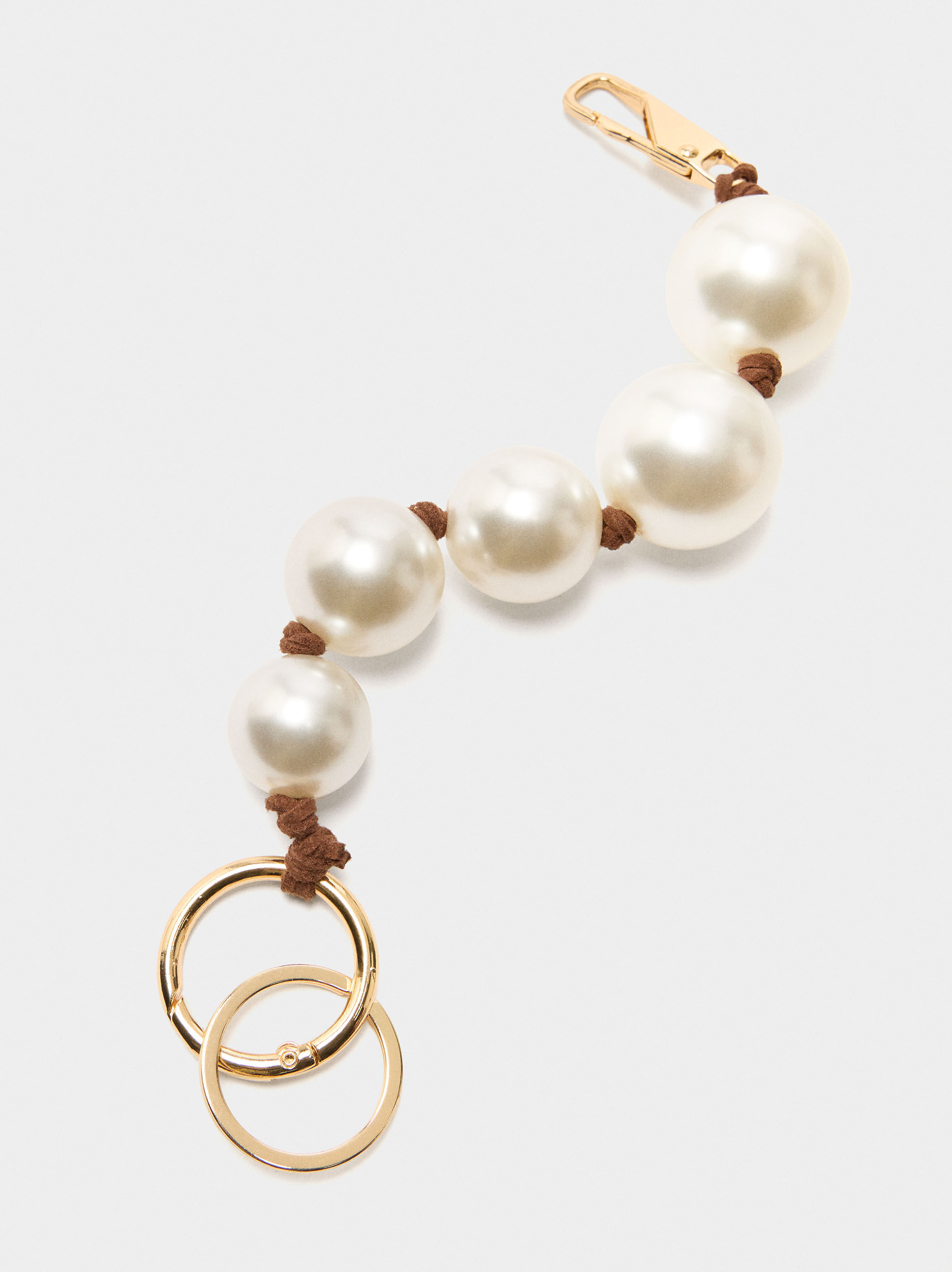 Porte-clés en forme de charm avec perles
